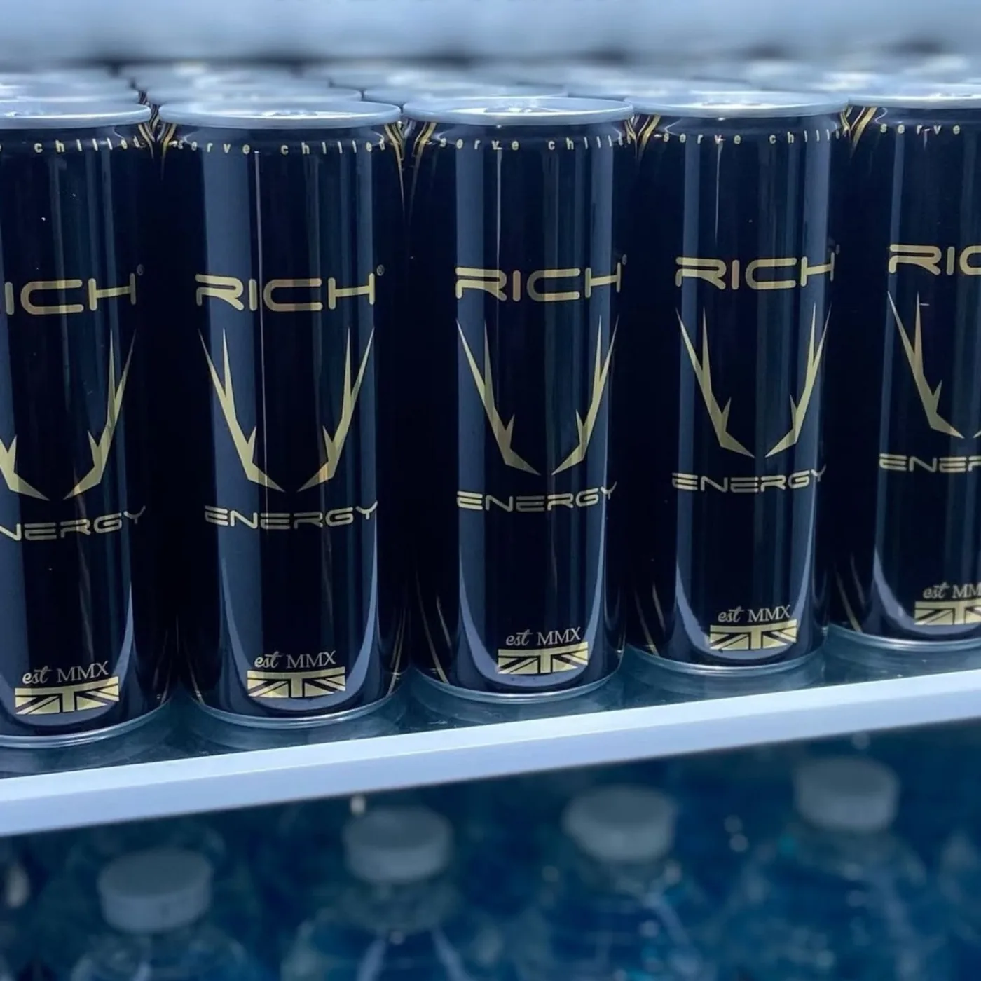 Rows of Rich Energy cans stocked in a chilled fridge